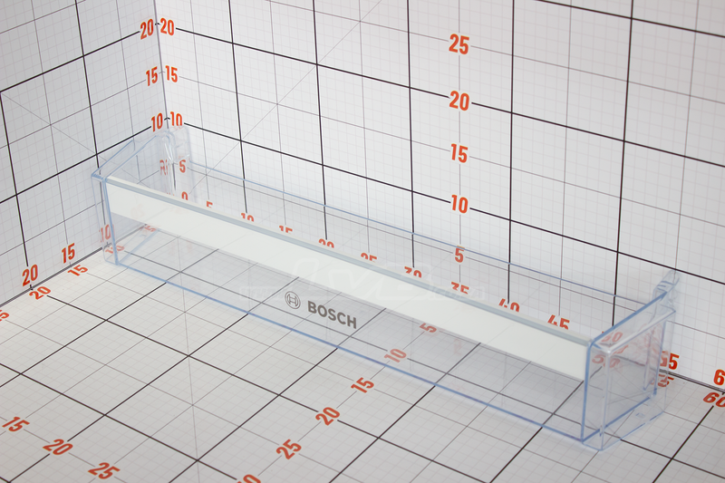 Clear plastic component with Bosch branding on a grid background